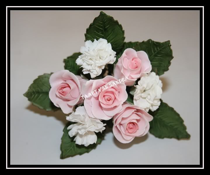 http://i826.photobucket.com/albums/zz181/Taart_van_Sandra/Miniboeketje-border.jpg