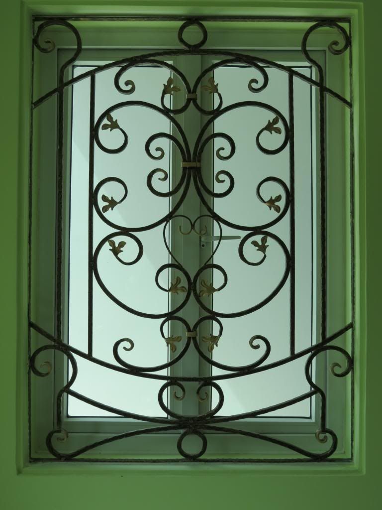 Bông bảo vệ cửa sổ - lang can - cầu thang - cửa cổng sắt nghệ thuật THÀNH LINH - 23