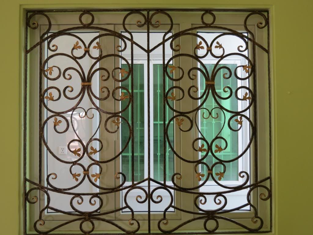 Bông bảo vệ cửa sổ - lang can - cầu thang - cửa cổng sắt nghệ thuật THÀNH LINH - 22