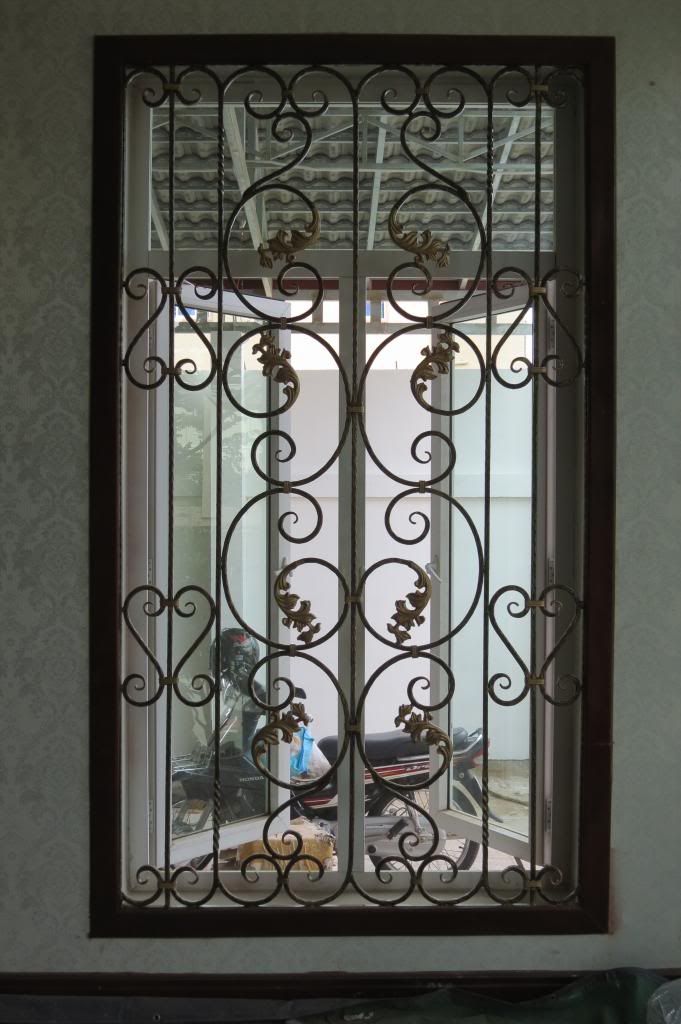 Bông bảo vệ cửa sổ - lang can - cầu thang - cửa cổng sắt nghệ thuật THÀNH LINH - 12